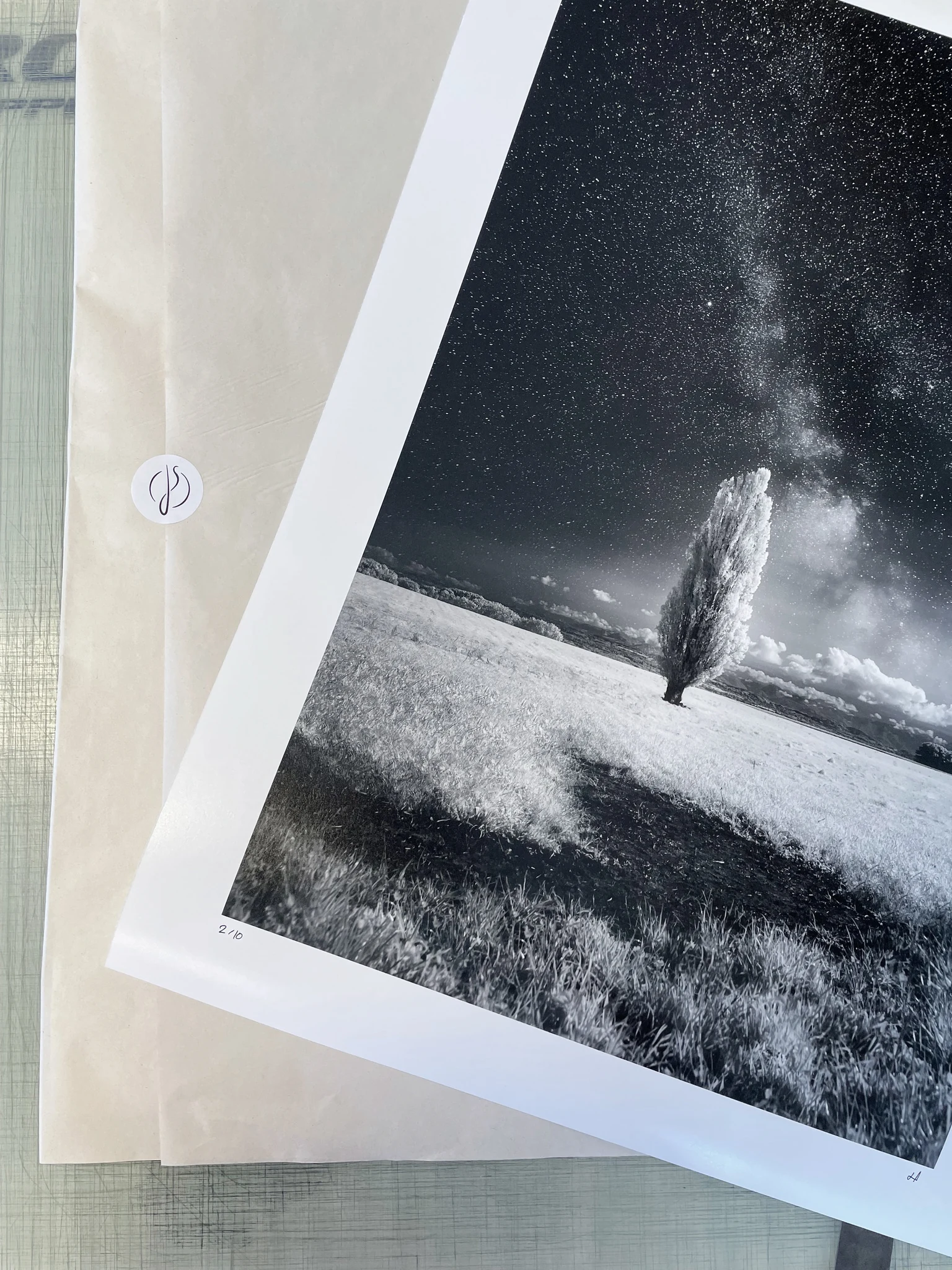 A photographic print numbered and signed by hand
